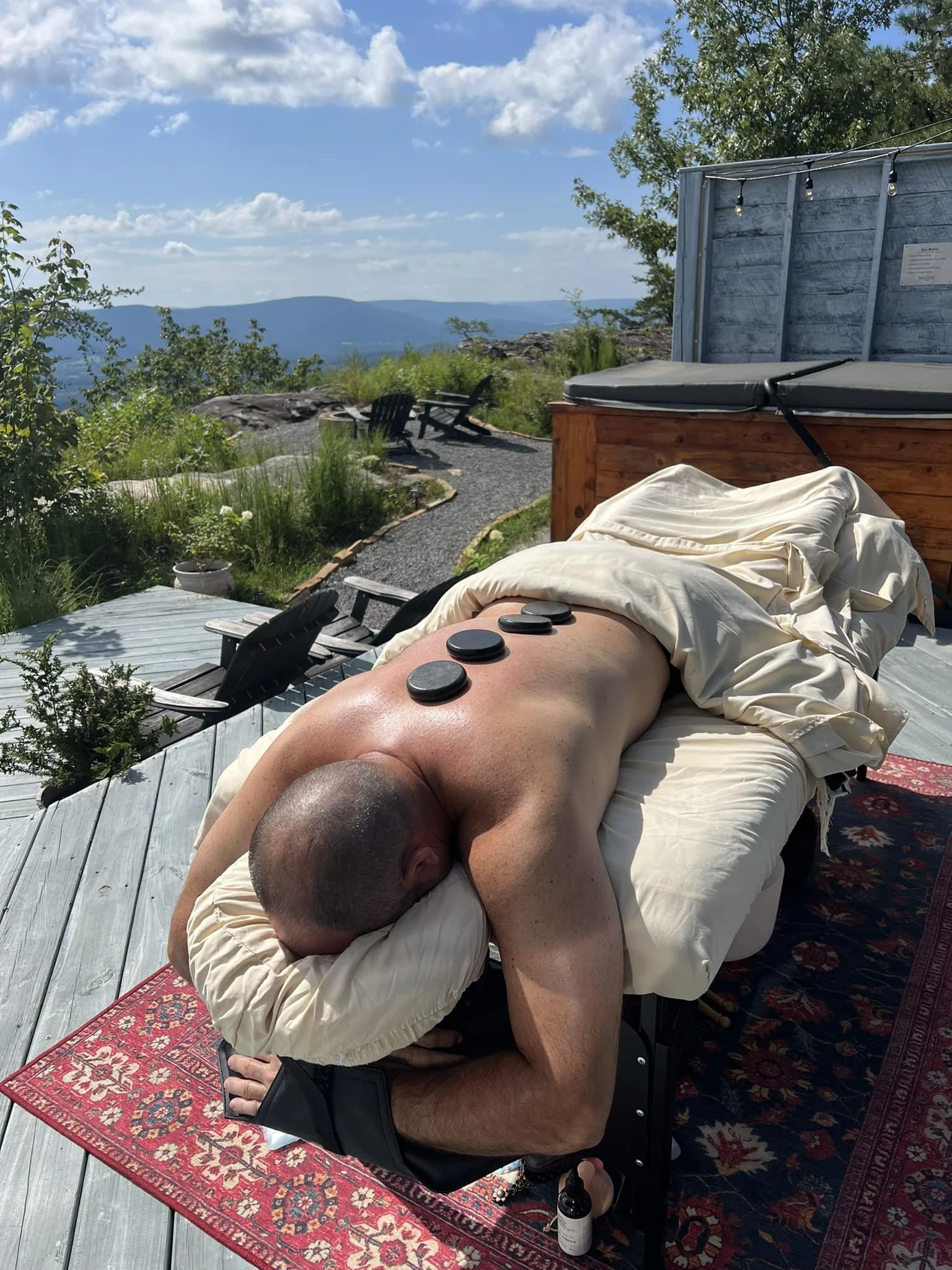 An outdoor massage setup overlooking the Tennessee mountains.